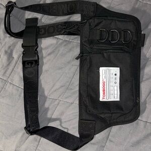 TOMBOGO CHEST PACK CROSS BODY BAG